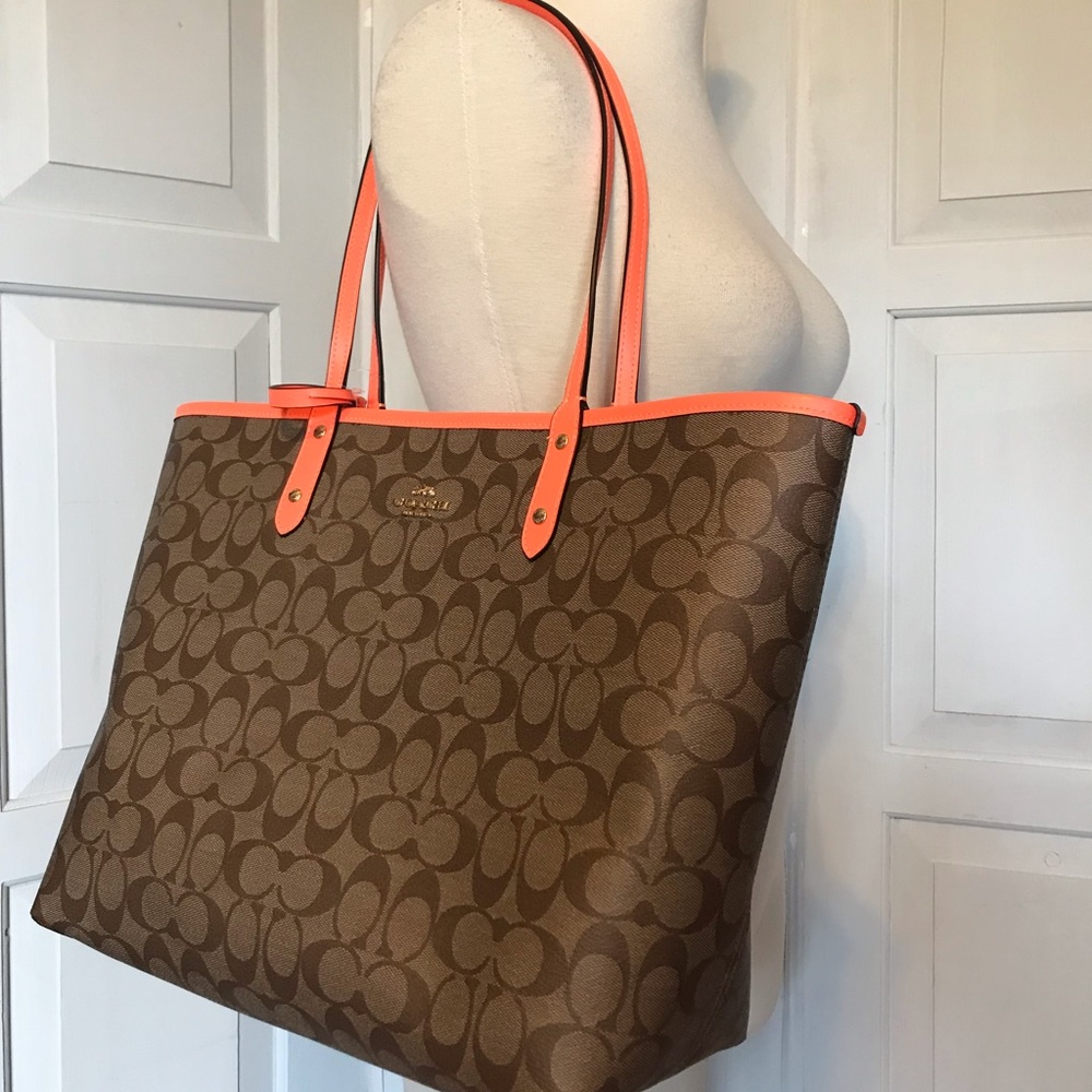 NWT Coach reversible PVC tote w/ clutch wristlet